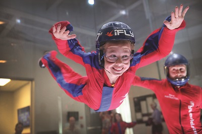 Child flying in wind tunnel 3