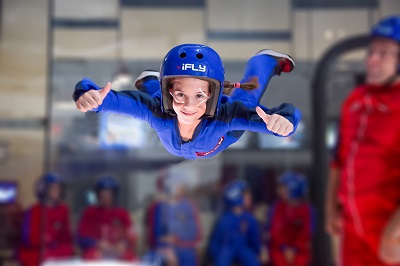 Child flying in wind tunnel 5